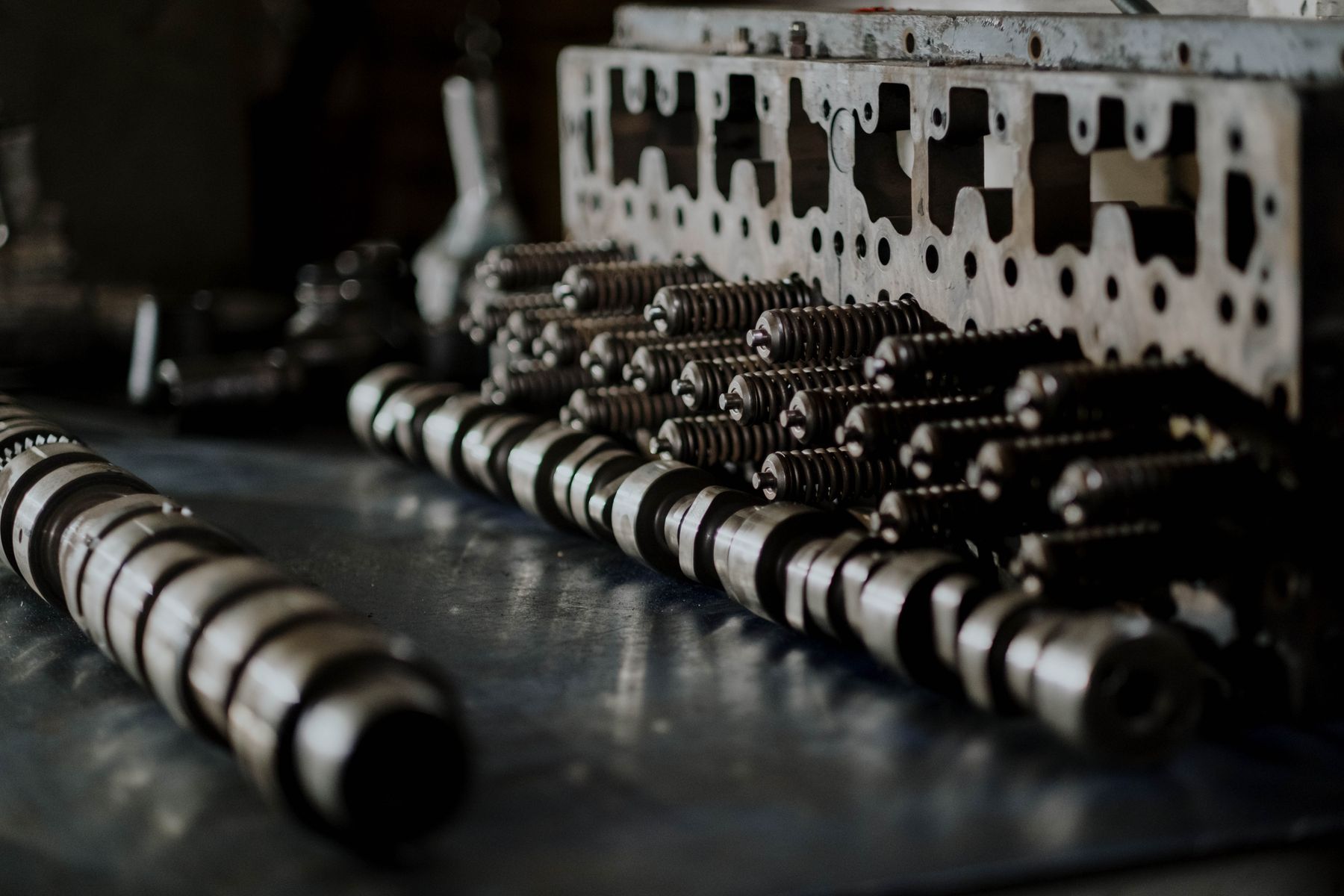 Close-up of precision automotive engine components and camshafts